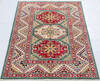 Kazak Green Hand Knotted 33 X 410  Area Rug 700-148341 Thumb 1